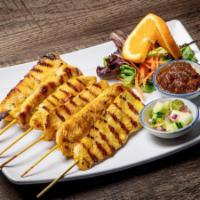 10. Chicken Sa-Te · 6 skewers. Marinated chicken served with peanut sauce and cucumber salad.