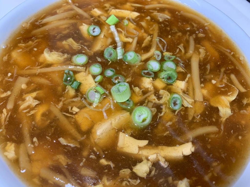 Hot and Sour Soup · A traditional Chinese soup with broth, eggs, tofu and vegetables. Spicy.