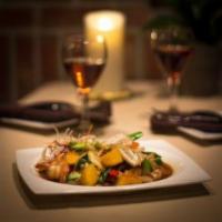Tropical Shrimp · Sauteed shrimp with seasonal mixed vegetables, fresh ginger and mango in a chef's special sa...