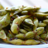 Chili Garlic Edamame · Soybeans in the pod, wok seared in fresh garlic, chili, and a touch of soy sauce. Goes Great...