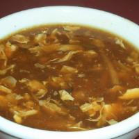 Hot Sour Soup · Minced chicken, mushroom, bamboo shoot and fresh tofu.