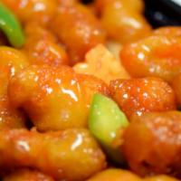 Sweet Sour Pork · Lightly fried pork (not battered) with green and red pepper, onions, and pineapple tossed in...