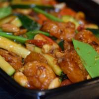 Kung Pao Shrimp · Crispy shrimp, snow peas, carrots, zucchini, peanuts and kung pao sauce.