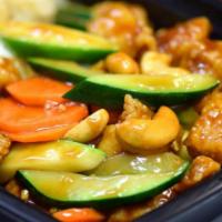 Cashew Nut Chicken · Diced chicken, snow peas, carrots, zucchini and cashew nuts.