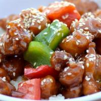 Sesame Chicken · Sesame seeds, green and red pepper.