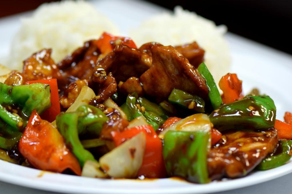 Pepper Steak · Onions, black pepper sauce, green and red peppers.