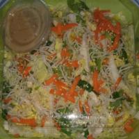 Chinese Chicken Breast Salad · Lettuce, green onion, Mandarin oranges, crispy noodles, sesame seeds and sesame dressing.