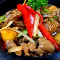 Thai Ginger Sauce · Sauteed with ginger, onions, bell peppers, pineapple, scallions and mushrooms. Served with r...