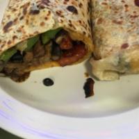 Burrito · Flour tortilla, choice of meat, cheese and black beans.