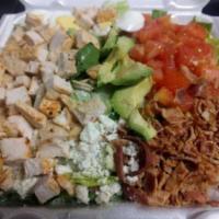 Cobb Salad · Mixed green lettuce, mesquite grilled chicken breast with bacon, tomatoes, hard boiled egg, ...