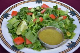 Fresh Green Salad · Fresh romaine lettuce, cucumber and tomato with homemade cumin cilantro dressing. Vegan and ...