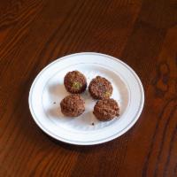 Falafel · 4 deep fried balls or patties made from ground chickpeas, spices and parsley served with tah...