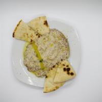 Baba Ghannouj and Pita · Mashed roasted eggplant adding a smoky flavor, mixed with fresh garlic, tahini, lemon juice ...