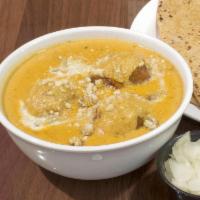 Malai Kofta · Vegetables mixed in with cheese balls fried and cooked in tomato based gravy.