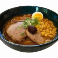 Spicy Miso Soup Ramen · Ramen noodle in spicy soy bean broth with pork, bamboo, hard boiled egg, corn and scallions.