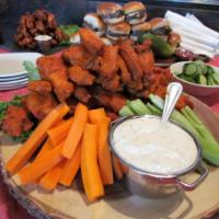 Wings By The Dozen · Includes celery, blue cheese, and choice of two sauces: mild, hot, insane, Kentucky bourbon ...