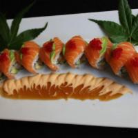Orange Blossom Roll · Shrimp tempura roll topped with salmon, tobiko, spicy mayo and eel sauce.