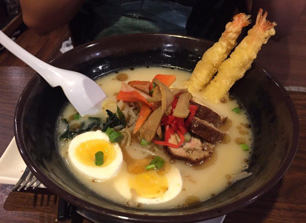 Super Bowl Ramen · Tonkotsu ramen with chashu pork, egg, tamago, kani, seaweed, fried garlic, and shrimp tempura.