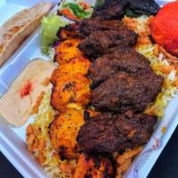 Darbar Kabob Combo Plate · Skewer of beef and chicken breast served with Rice or French Fries, Salad, Pita Bread, with ...