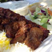 Beef Soltani · 1 skewer of Beef Steak meat with 1 skewer of Ground Beef served with Rice or French Fries, S...