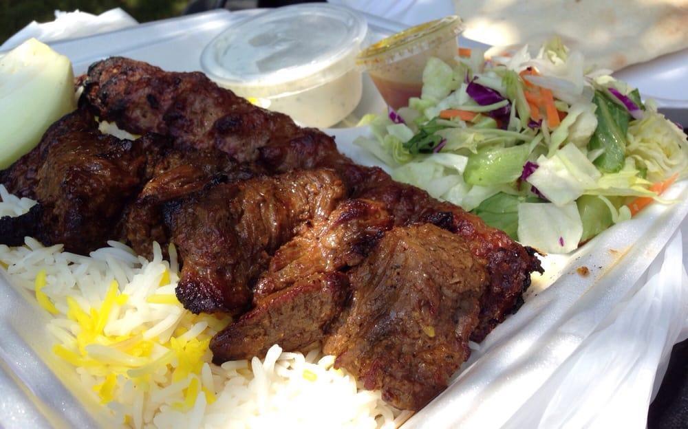 Beef Soltani · 1 skewer of Beef Steak meat with 1 skewer of Ground Beef served with Rice or French Fries, Salad, Pita Bread, with your choice of Hummus or Tzatziki (Yogurt Dip).