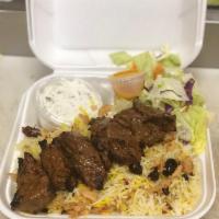 Beef Kabob Combo Plate · Filet Mignon Steak served with Rice or French Fries, Salad, Pita Bread, with your choice of ...