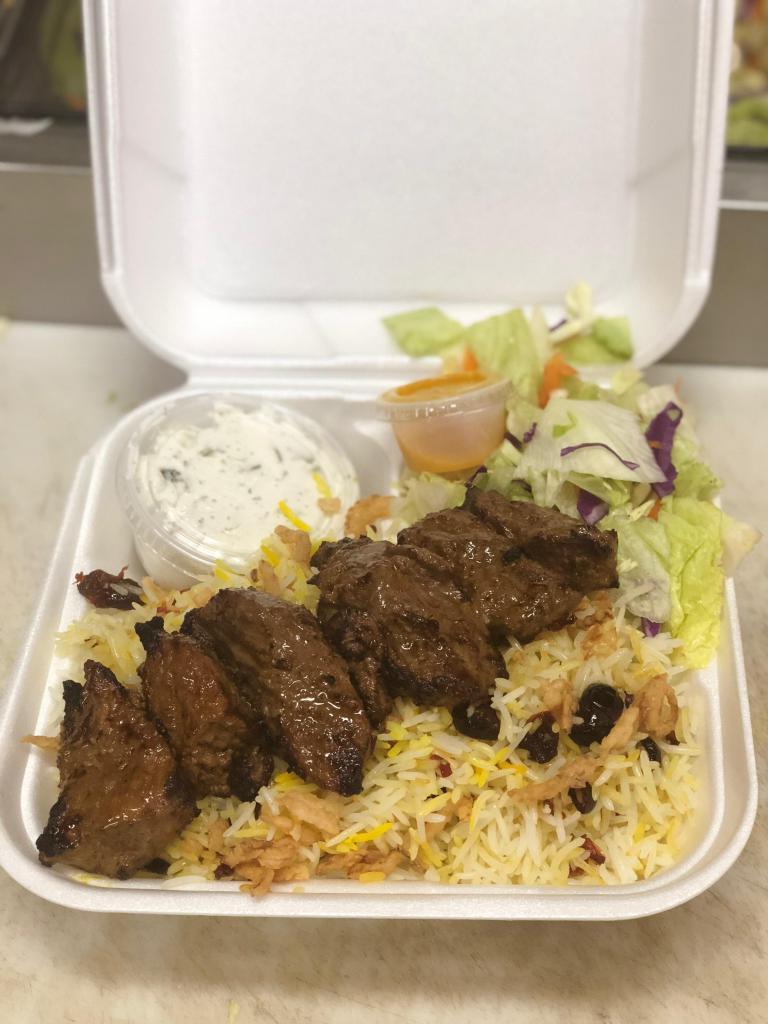 Beef Kabob Combo Plate · Filet Mignon Steak served with Rice or French Fries, Salad, Pita Bread, with your choice of Hummus or Tzatziki (Yogurt Dip). (Pictured with Cherry Rice)