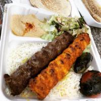 Mix Luleh (Koobideh) · 2 skewers of Ground Beef and Ground Chicken served with Rice or French Fries, Salad, Pita Br...