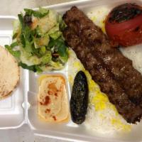 Beef Luleh (Koobideh) · 2 skewers of Ground Beef served with Rice or French Fries, Salad, Pita Bread, with your choi...
