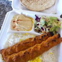 Chicken Luleh (Koobideh) · 2 skewers of Ground Chicken served with Rice or French Fries, Salad, Pita Bread, with your c...