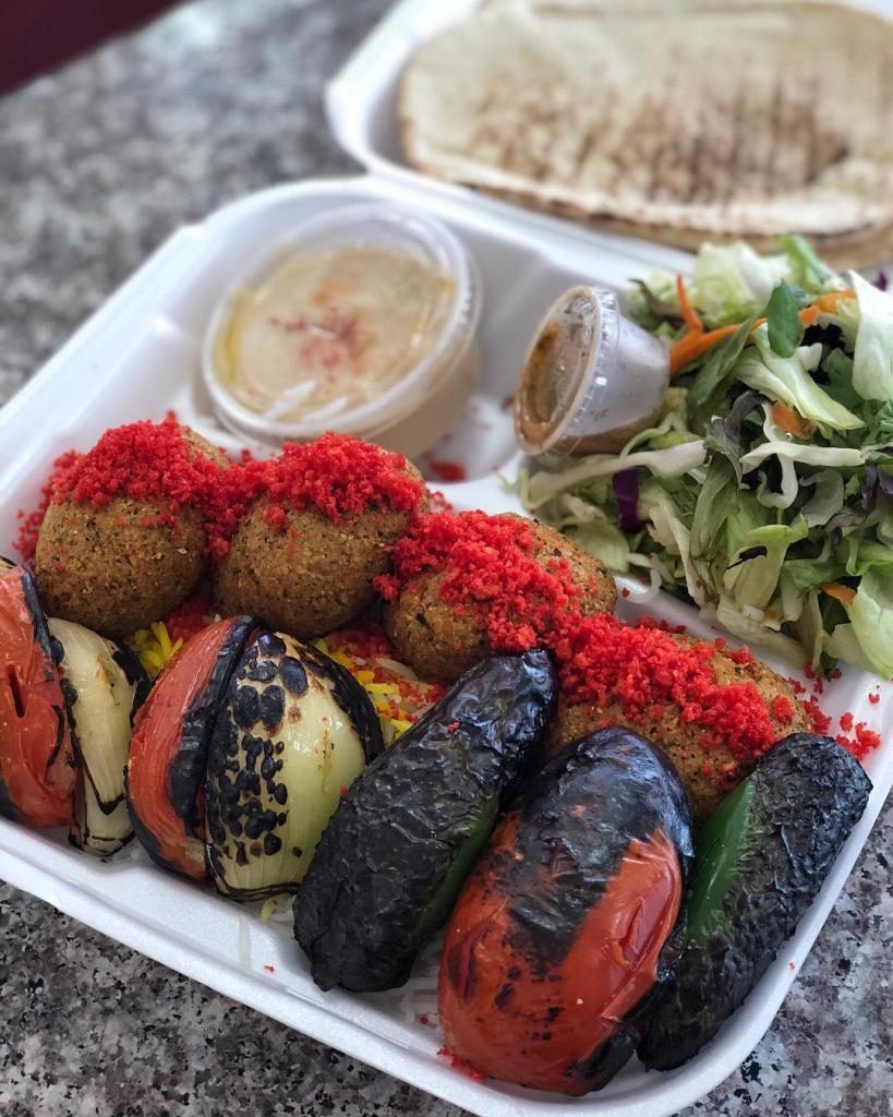 Veggie Delight Combo Plate · 4 Falafels, Skewer of vegetable BBQ served with Rice or French Fries, Salad, Pita Bread, with your choice of Hummus or Tzatziki (Yogurt Dip).