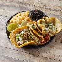 3 Tacos Meal · Corn tortillas your choice of filling with cilantro onions lime and salsa.