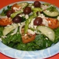 Greek Salad · Lettuce, tomatoes, red onions, cucumbers, kalamata olives, feta cheese and Greek dressing.