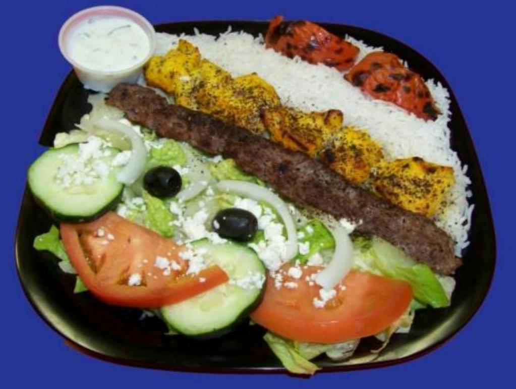 Mixed Grill 2 · One skewer of our marinated all white chicken breast and one skewer of our deliciously lean beef kebab served with basmati rice and a side Greek salad and tzatziki sauce. Grilled to order maximum freshness and satisfaction.