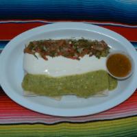 Super Quesadilla · Flour tortilla with melted cheese, meat topped with guacamole, sour cream and pico de gallo ...