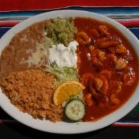 Camarones a la Diabla · Shrimp with hot or mild red sauce. Served with rice, re-fried beans, lettuce, sour cream, gu...