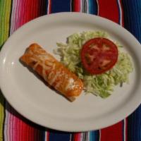 Enchilada · This includes 1 enchilada with choice of meat, topped with red sauce and cheese. Includes le...