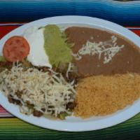 Alambres Plate · Grilled steak sauteed with bacon, bell peppers, onions and tomatillo sauce topped with chees...