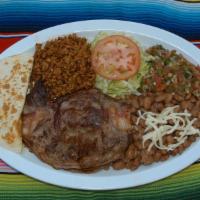 Parrillada Mexicana Plate · Beef, bacon, chorizo, small quesadilla served with rice, whole pinto beans, lettuce, pico de...