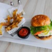 Sun Set Burger · Sunny side egg served over 1/4 Angus beef on a golden brioche bun topped by crispy romaine l...