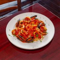 Frutti Di Mare · A true seafood feast. Combination of shrimp, calamari, mussels and clams tossed in our homem...