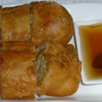 Vegetarian Egg Rolls · 2 pieces. Deep fried egg rolls stuffed with BBQ pork, shrimp, cabbage, bean sprouts and carr...