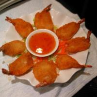 Pearl River's Butterfly Shrimp · 8 pieces. Lightly deep fried battered butterfly shrimp served with sweet Thai chili dip.