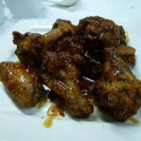 Chinese Buffalo Wings · 8 pieces. Deep fried battered wings stir fried with spicy garlic sauce. 