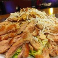 Chinese Chicken Salad · Crispy fried breaded or grilled chicken topped over fresh lettuce, carrots, minced cashew nu...
