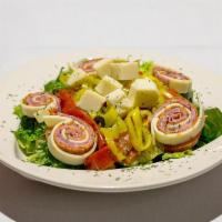 Antipasto Salad · Our large garden salad topped with Italian cold cuts and cheeses, red peppers and banana pep...