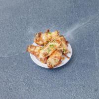 Honey Buffalo · Tossed in our buffalo sauce and topped with honey mustard