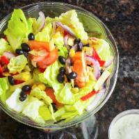 Mexican Salad · Romaine, cheddar and jack cheese, red onion, black beans, tortilla strips, tomato, roasted c...