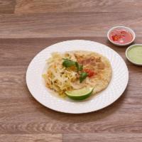 Revueltas Pupusa · Carnitas and beans. Filling thick hand-made fresh tortilla, all made with cheese, served wit...