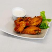 Buffalo Chicken Wings · Fresh chicken wings marinated for 24 hours fried to perfection served with choice of style a...